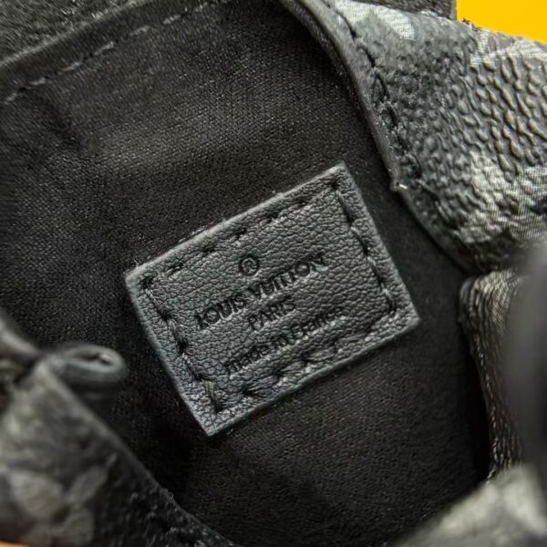 Black leather mini bag with buckle design