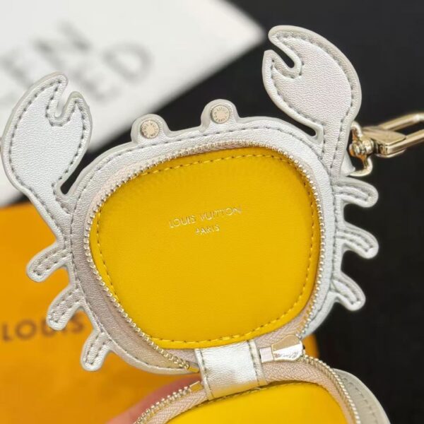 Interior view of luxury crab shape leather keychain pouch showing spacious compartment for coins and keys.