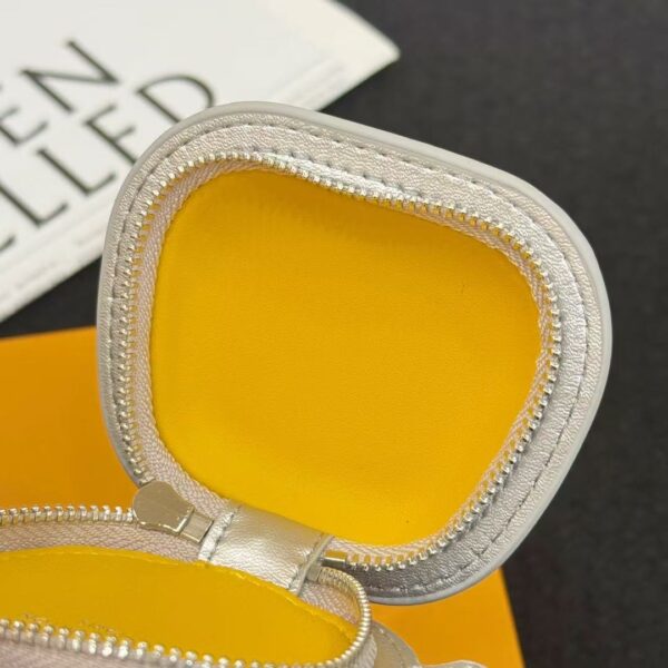 Interior view of luxury crab shape leather keychain pouch showing spacious compartment for coins and keys.