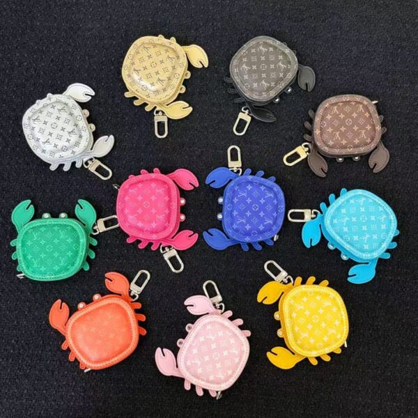 Colorful collection of luxury crab leather keychain pouches in 10 colors